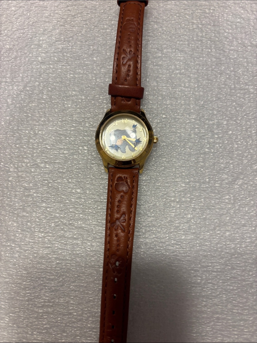Disney Eeyore  Embossed Leather Strap Watch.